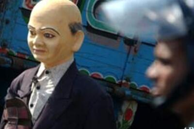 Bangla poll chief goes, blockade remains