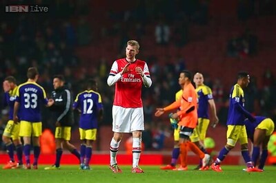 Swansea draw 2-2 at Arsenal in Premier League