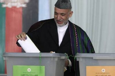 Sporadic attacks as Afghans vote to elect new govt