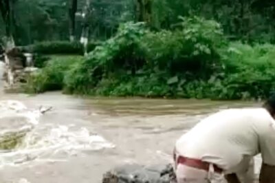 WATCH: Jalpaiguri Policemen Carry School Children on Waterlogged Street Amid Heavy Rainfall