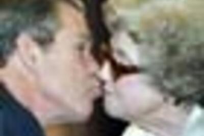 In Pics: Bush's brush with kisses