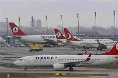 Turkey's national airline bans female flight attendants from wearing red lipstick, nail polish