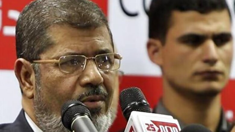 Egypt's Islamist President Mursi gets to work