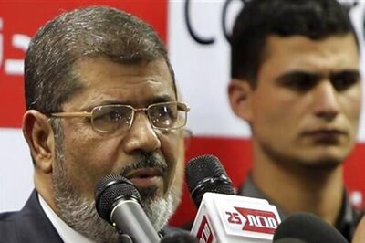 Egypt's Islamist President Mursi gets to work
