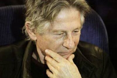 Polanski released on bail, gets into house arrest