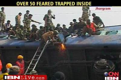 At least 50 trapped in mangled train coaches