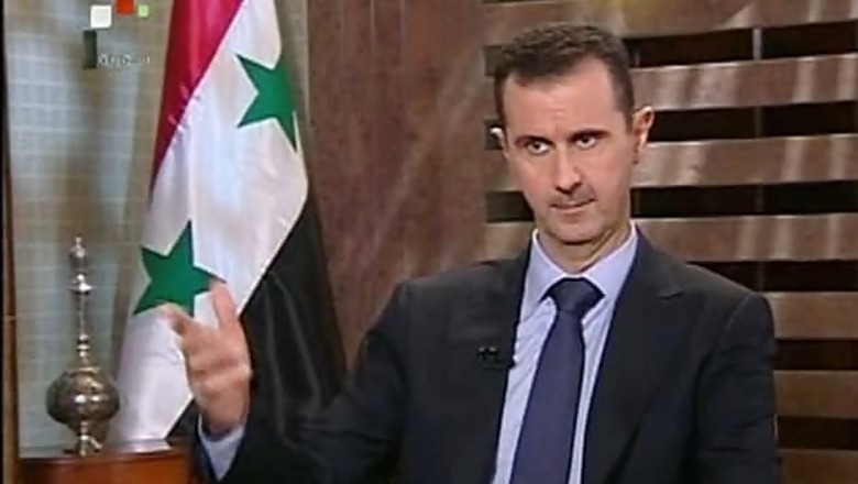New Iranian president vows support for Syria's Assad