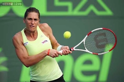 Petkovic survives set point to win WTA Family Circle Cup