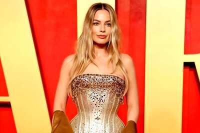 Margot Robbie Stuns in Gold Copper Dress From Mugler At the Vanity Fair Oscar Party