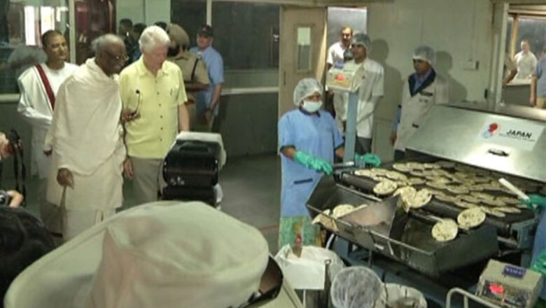 Bill Clinton visits 'Akshaya Patra's' kitchen, serves food to students