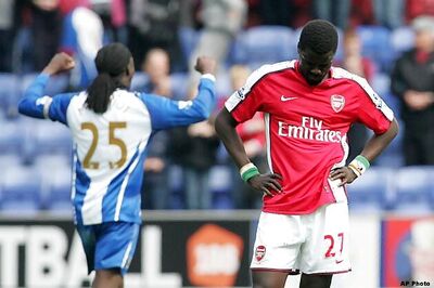 Wigan ends Arsenal title hopes in 3-2 win
