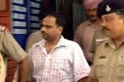 Cash-for-judgement scandal: Ex-officer held