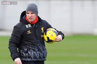 Liverpool coach stays grounded as title charge gains pace