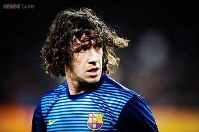 Barcelona's Carles Puyol plays first game in seven months