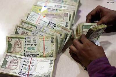 Rupee gains 12 paise against US dollar, closes at 62.22
