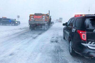 Flights Canceled, Roads Treacherous Amid Spring Snowstorms