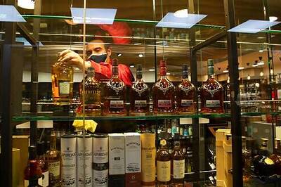 South Africa opens as virus cases fall, allows liquor sales