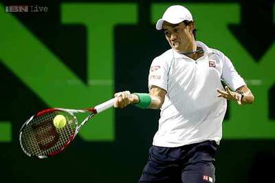 Kei Nishikori, Ernests Gulbis storm into Barcelona Open semifinals