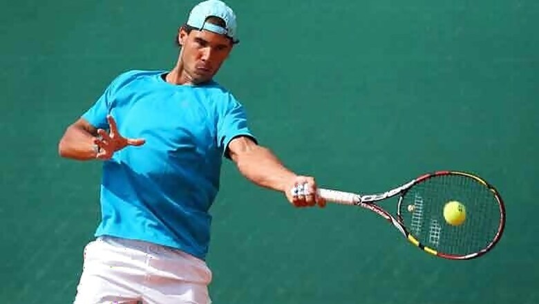 Rafael Nadal trains after wrist injury