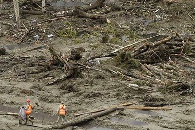 Mudslide death toll rises, rains expected to ease