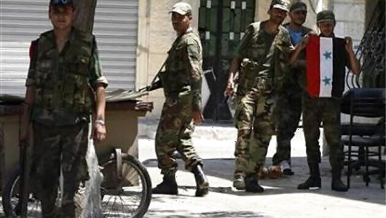Syrian forces stretched, Assad's spy chief dead
