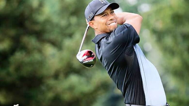 Tiger Woods shoots first-round 66 at Firestone