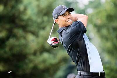 Tiger Woods shoots first-round 66 at Firestone