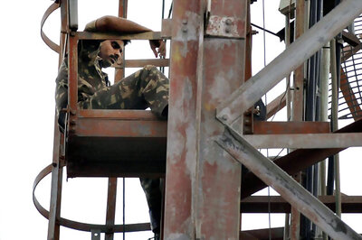 'Harassed' armyman climbs tower, refuses to come down