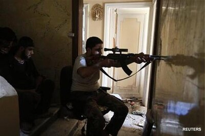 Syrian helicopter crashes under fire in Damascus