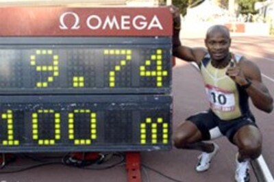 Powell blazes to new 100 metres world record