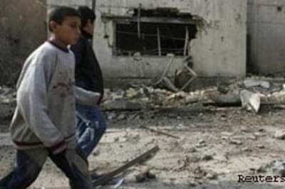 Twin Baghdad blasts kill 15, wound 70