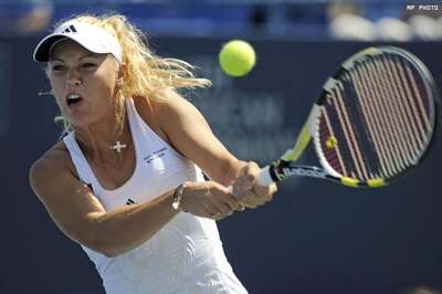 Wozniacki, Stakhovsky win New Haven titles