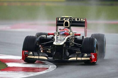 Grosjean fastest in wet practice for British GP