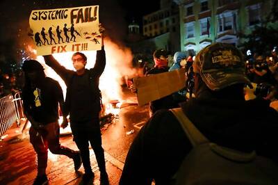 New York City Picks up the Pieces After Night of Unrest, Curfew Extended