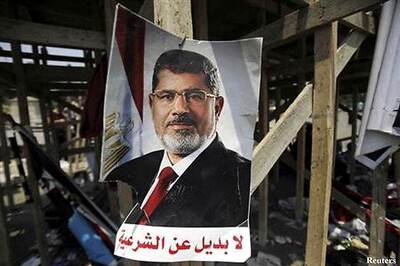 Egypt and Morsi don't mix, read placards at Tahri Square