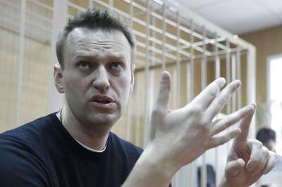 Putin foe Navalny Pushes Kremlin Bid Despite Legal Problems