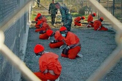 US President Obama orders halt to Guantanamo trials
