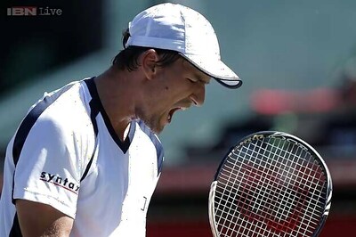 Switzerland advance in Davis Cup, beat Serbia