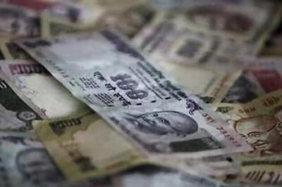 Rupee hits an all-time low of 57.12 against US dollar