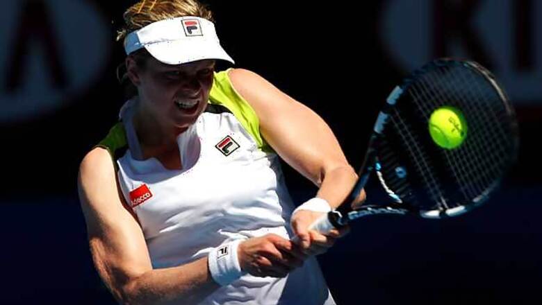 Clijsters beats Wozniacki to move into semis