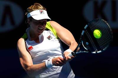Clijsters beats Wozniacki to move into semis
