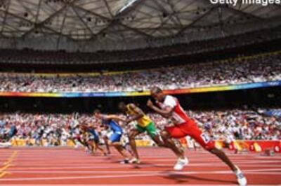 Favourites sail through men's 100m heats