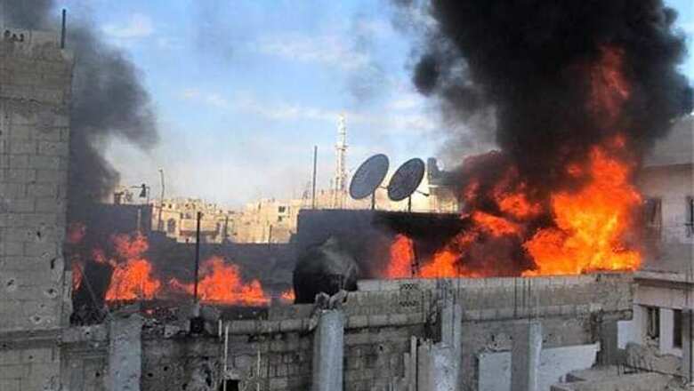 Syrian rebels quit besieged Homs stronghold