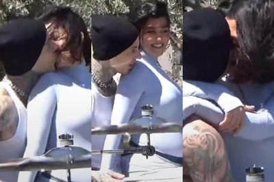 Kourtney Kardashian and Travis Barker Lock Lips as They Announce They're Having a Boy; Watch