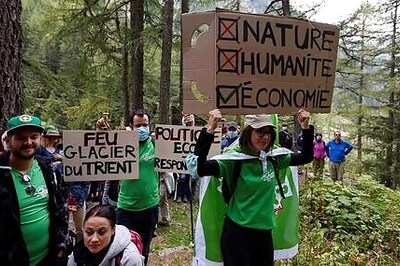 Climate Activists Gathered At Trient Glacier Mourn Switzerland's Receding Ice
